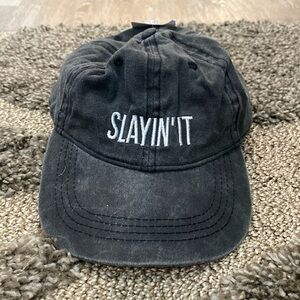 NEW. Ball Cap/Hat with adjustable strap. One size.